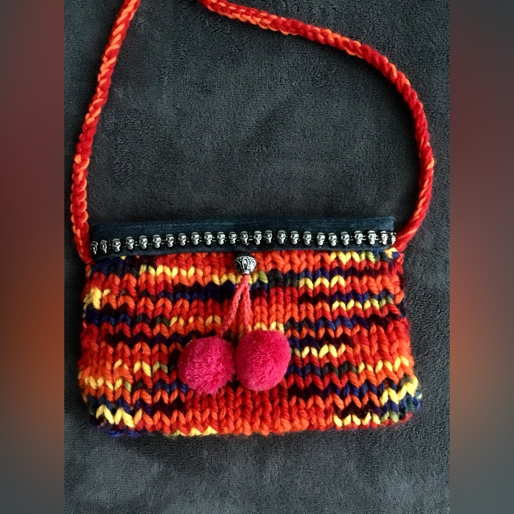 Vibrant Red and Orange Crossbody Bag with Pom Pom